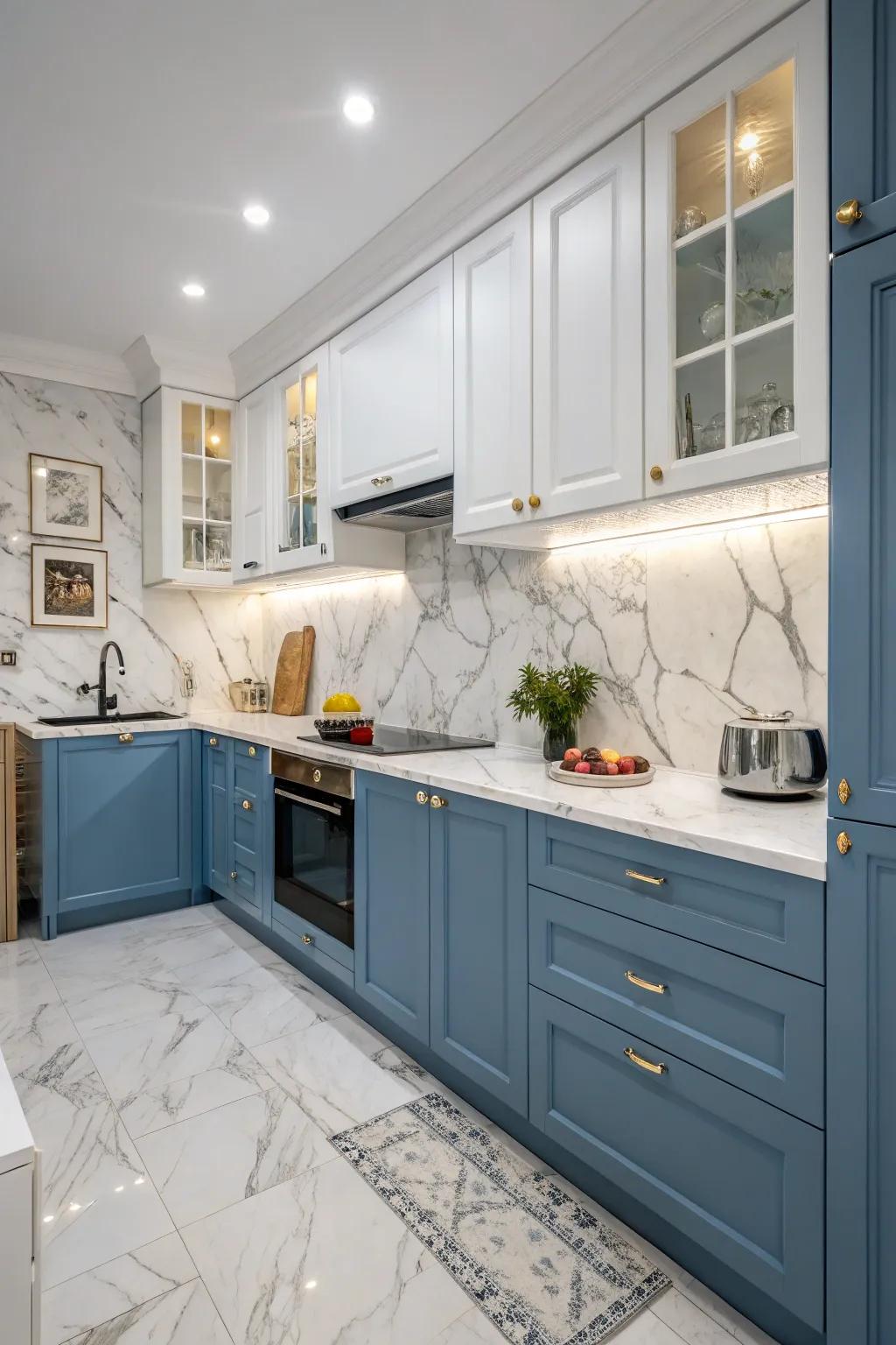 Blue cabinets with marble accents create a luxurious kitchen setting.