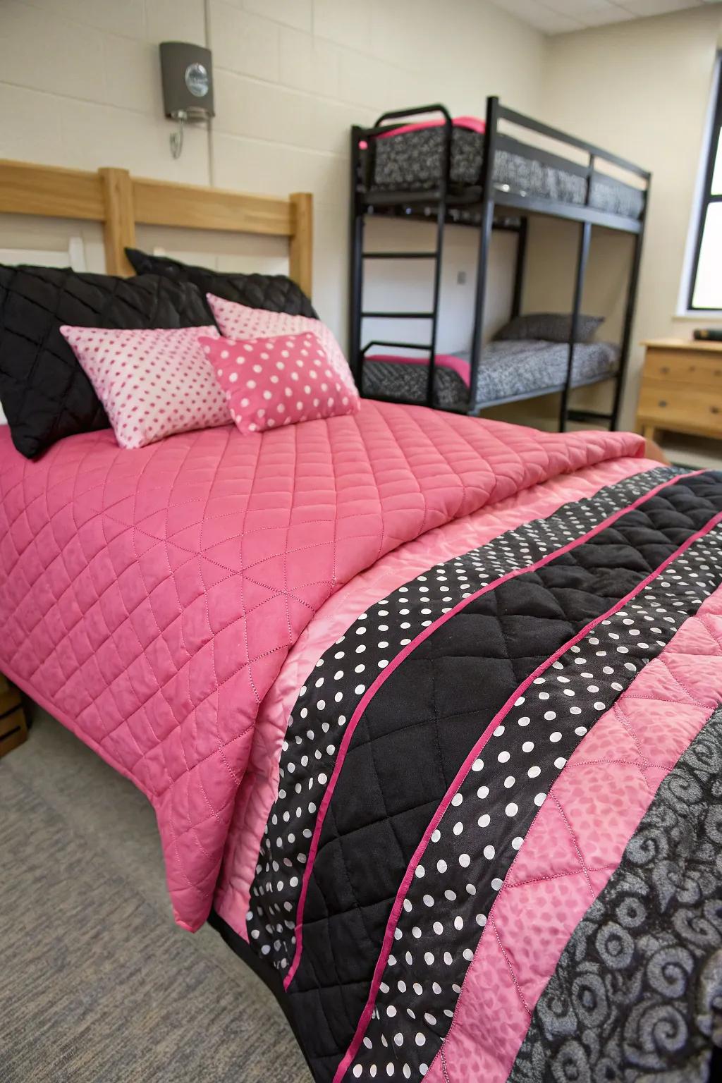 Texturally rich black and pink bedding ensemble.