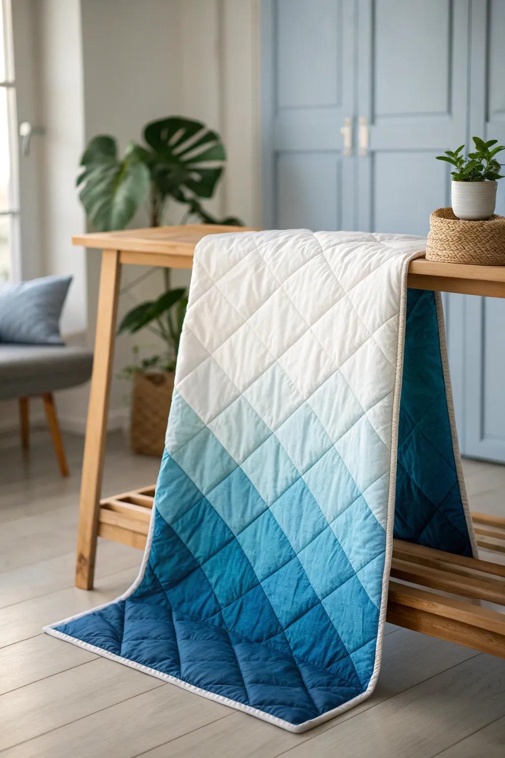 Embrace the serenity of ocean waves with a beautifully crafted quilt cornerstone, showcasing a perfect gradient transition from blue to white. #Craftsmanship #MinimalistBeauty